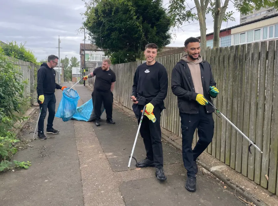 4 volunteers on a footpath in Druids Heath